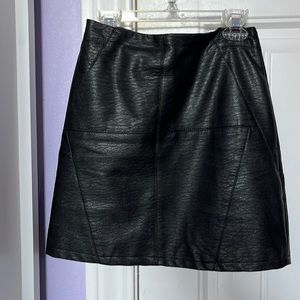 Divided black leather mini skirt